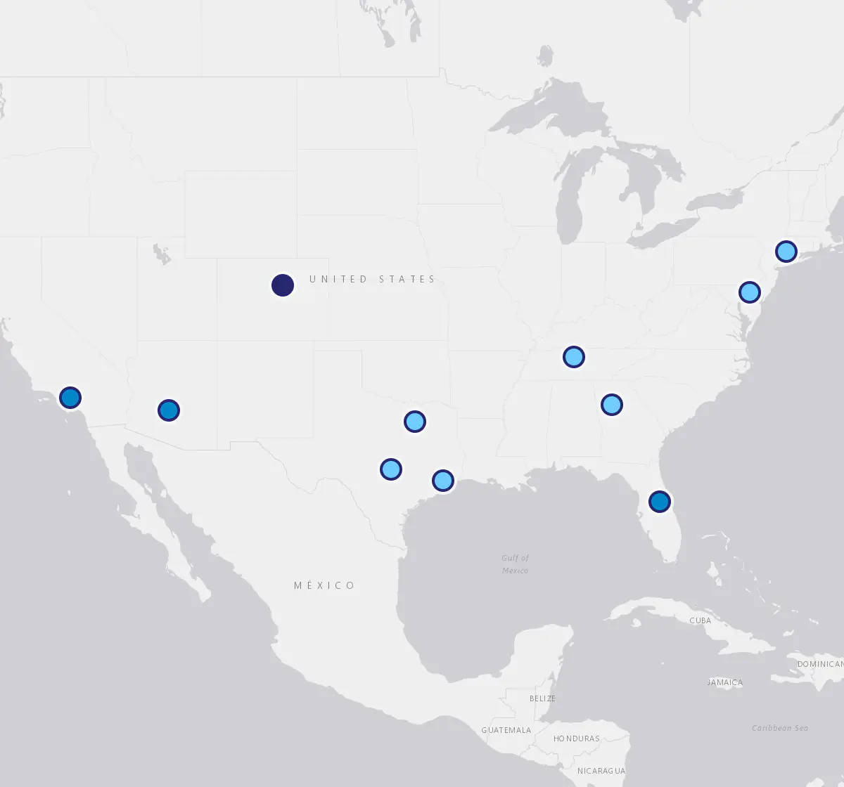 A still of the map's opening view over the United States, with a pin at each market.